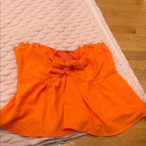 Orange off the shoulder tie in center top